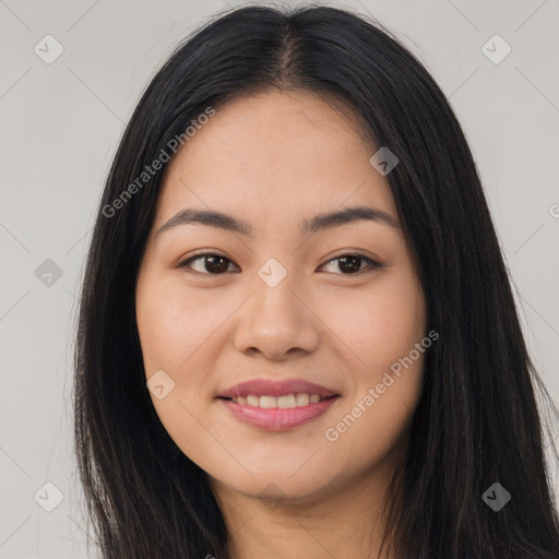 Joyful asian young-adult female with long  brown hair and brown eyes