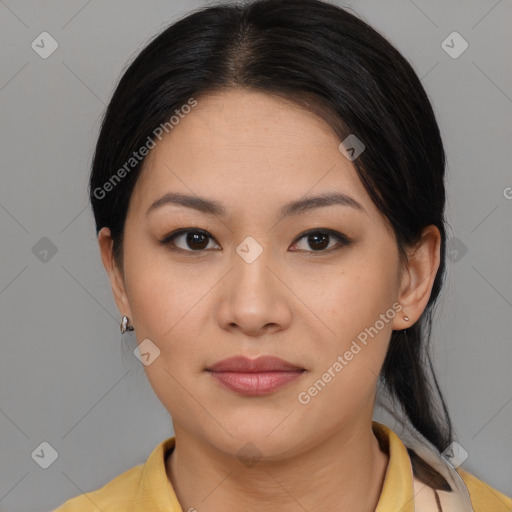 Joyful asian young-adult female with medium  brown hair and brown eyes