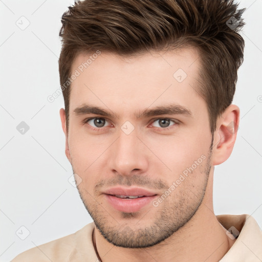 Neutral white young-adult male with short  brown hair and brown eyes