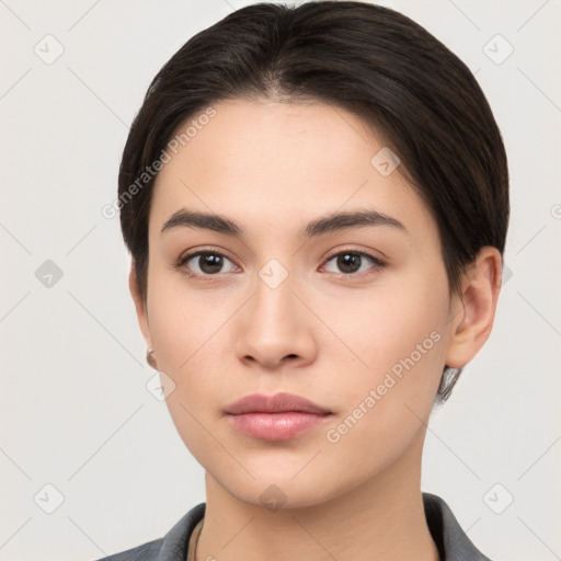 Neutral white young-adult female with short  brown hair and brown eyes