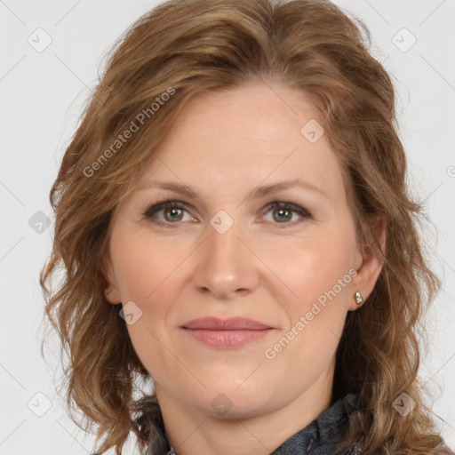 Joyful white adult female with long  brown hair and brown eyes