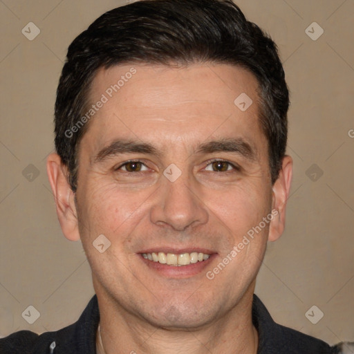 Joyful white adult male with short  brown hair and brown eyes