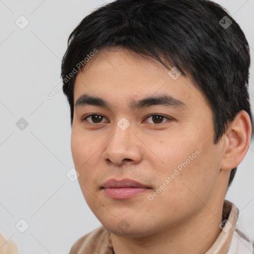 Joyful white young-adult male with short  black hair and brown eyes