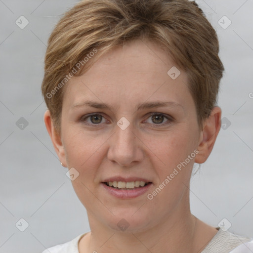 Joyful white young-adult female with short  brown hair and grey eyes