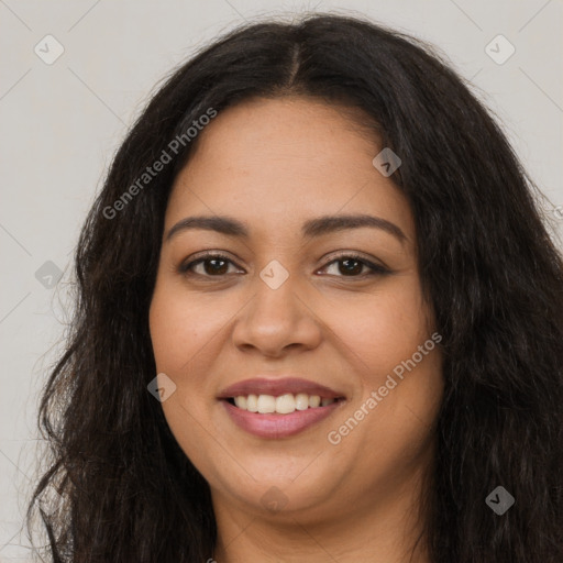 Joyful latino young-adult female with long  brown hair and brown eyes