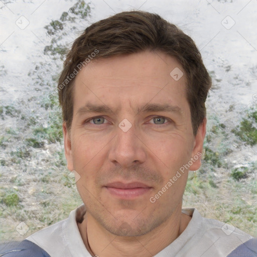 Joyful white adult male with short  brown hair and grey eyes