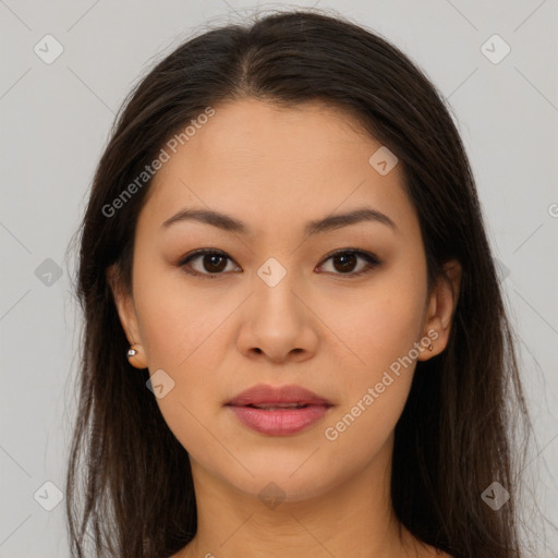 Joyful asian young-adult female with long  brown hair and brown eyes