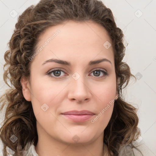 Joyful white young-adult female with medium  brown hair and green eyes