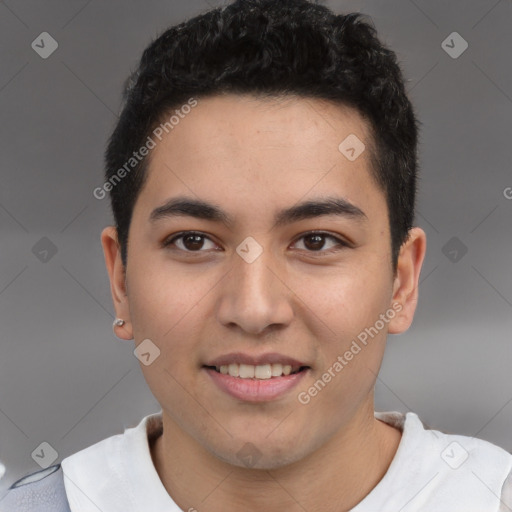 Joyful latino young-adult male with short  brown hair and brown eyes