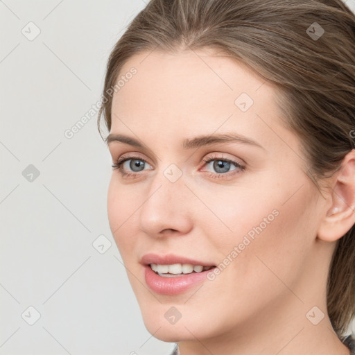 Joyful white young-adult female with medium  brown hair and blue eyes