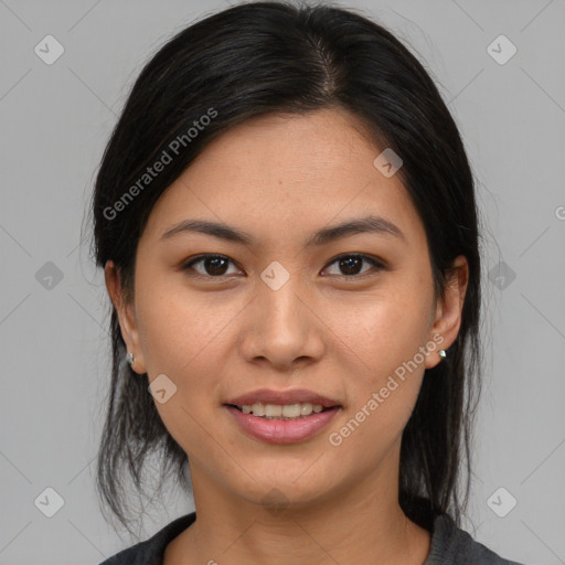 Joyful asian young-adult female with medium  black hair and brown eyes