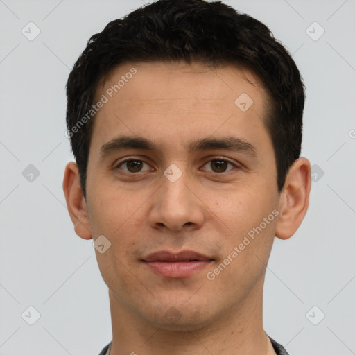 Joyful white young-adult male with short  black hair and brown eyes