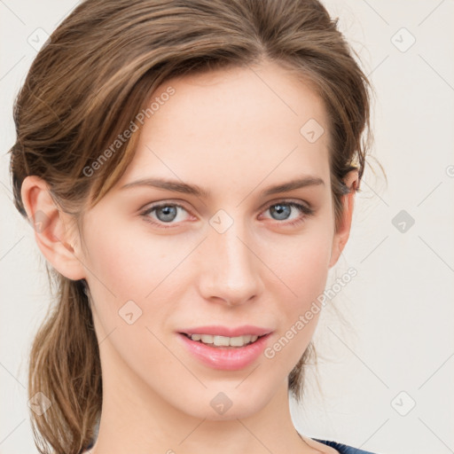 Joyful white young-adult female with medium  brown hair and blue eyes