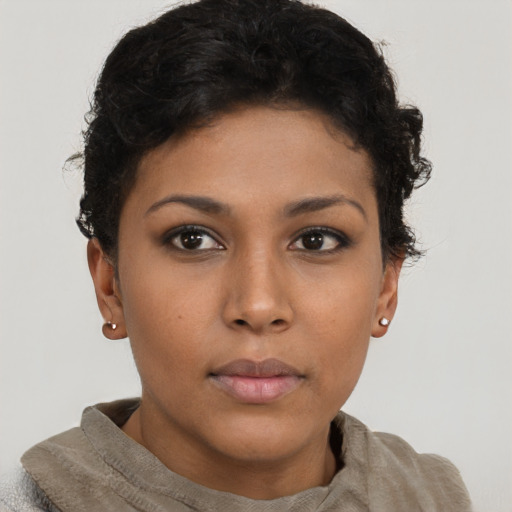 Neutral latino young-adult female with short  brown hair and brown eyes