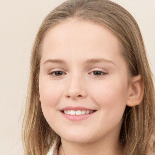 Joyful white child female with long  brown hair and grey eyes