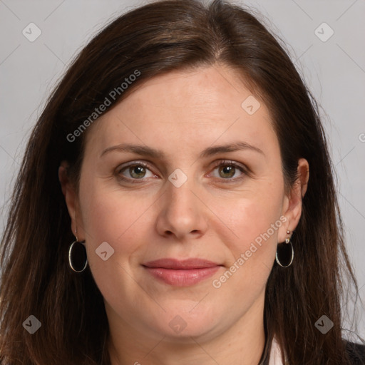 Joyful white adult female with long  brown hair and brown eyes