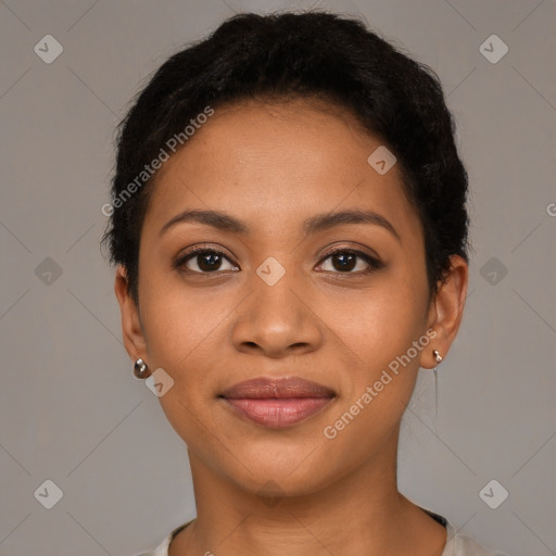 Joyful latino young-adult female with short  brown hair and brown eyes