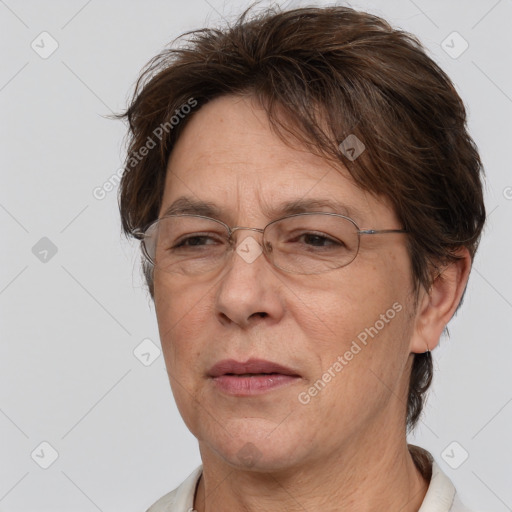 Joyful white middle-aged female with short  brown hair and brown eyes