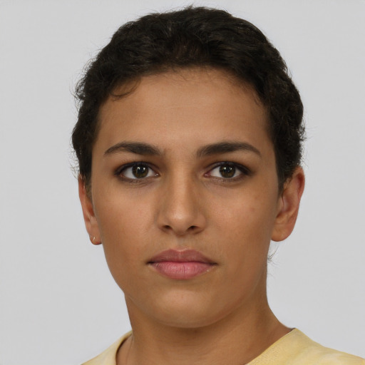 Neutral latino young-adult female with short  brown hair and brown eyes
