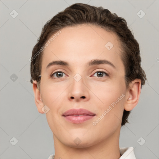 Joyful white young-adult female with short  brown hair and brown eyes