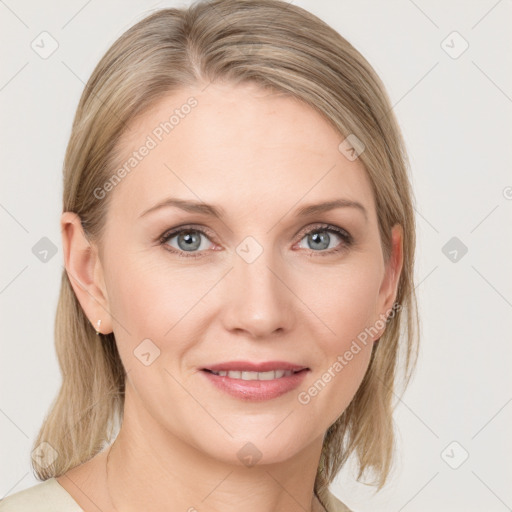 Joyful white young-adult female with medium  brown hair and blue eyes