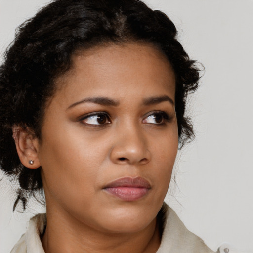 Neutral latino young-adult female with medium  brown hair and brown eyes