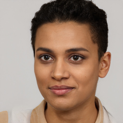 Joyful latino young-adult female with short  brown hair and brown eyes