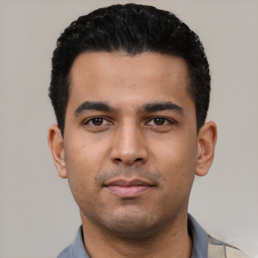 Neutral latino young-adult male with short  black hair and brown eyes