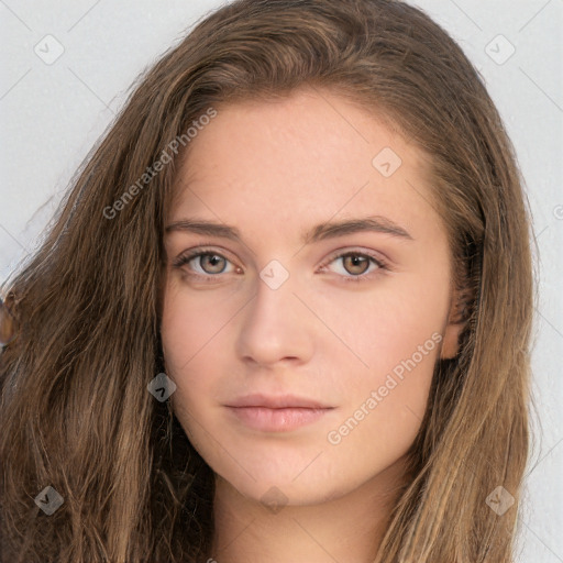 Neutral white young-adult female with long  brown hair and brown eyes