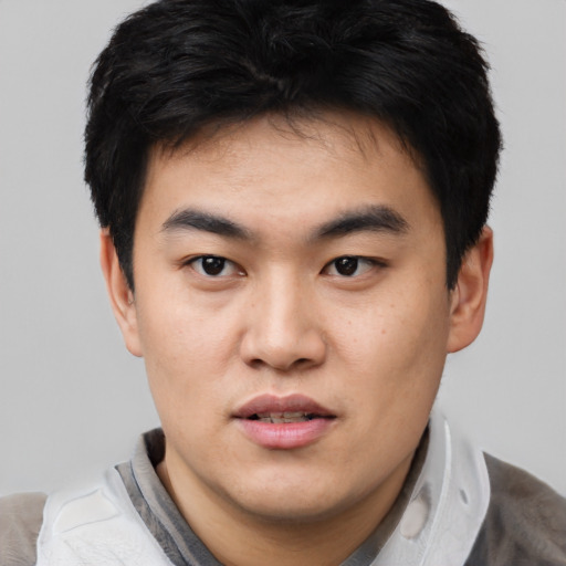 Neutral asian young-adult male with short  black hair and brown eyes