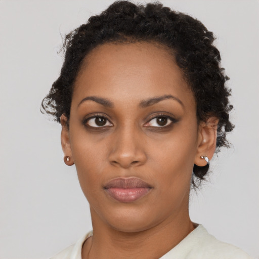 Neutral black young-adult female with short  black hair and brown eyes