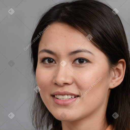 Joyful white young-adult female with long  brown hair and brown eyes