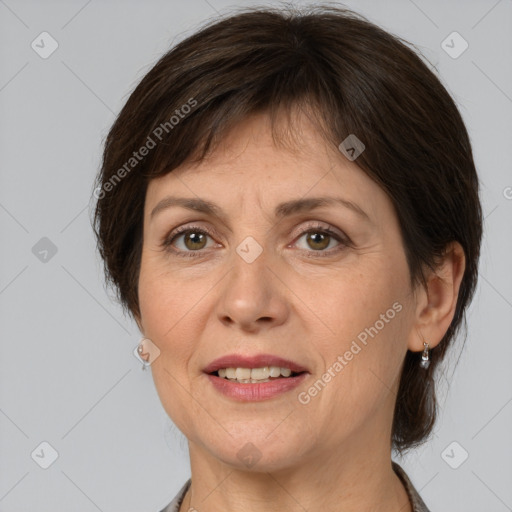 Joyful white adult female with medium  brown hair and brown eyes