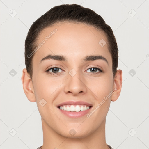 Joyful white young-adult female with short  brown hair and brown eyes