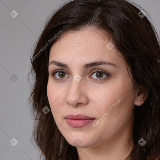 Neutral white young-adult female with long  brown hair and brown eyes