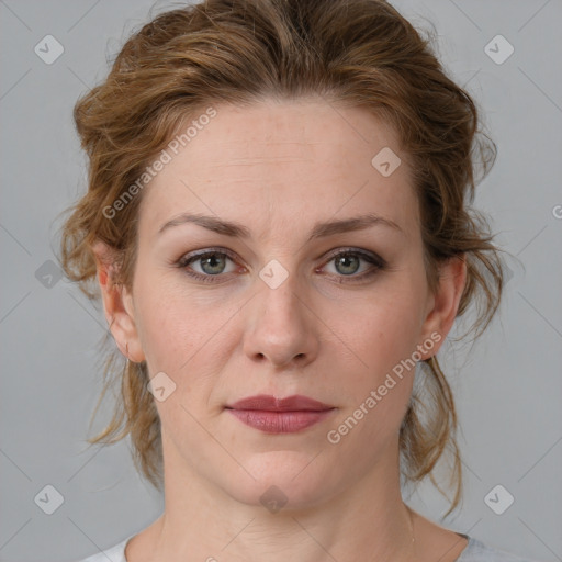 Joyful white young-adult female with medium  brown hair and blue eyes