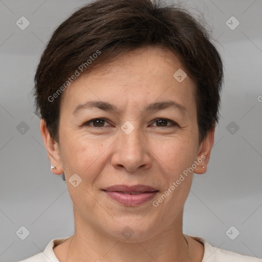 Joyful white adult female with short  brown hair and brown eyes