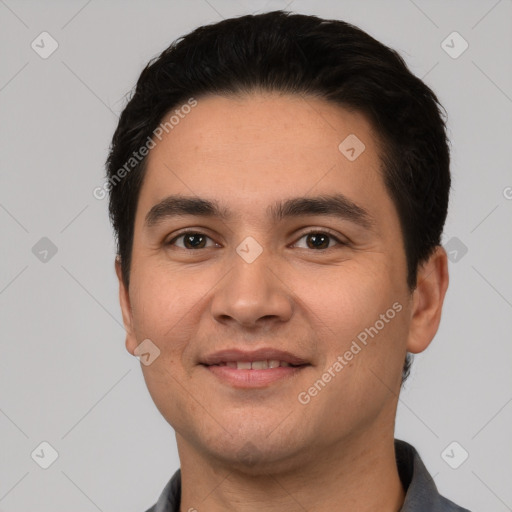 Joyful white young-adult male with short  black hair and brown eyes