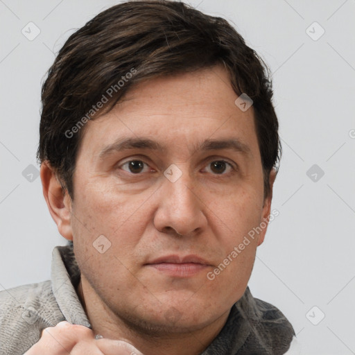 Neutral white adult male with short  brown hair and grey eyes