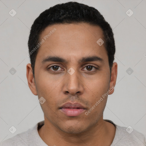 Neutral latino young-adult male with short  black hair and brown eyes