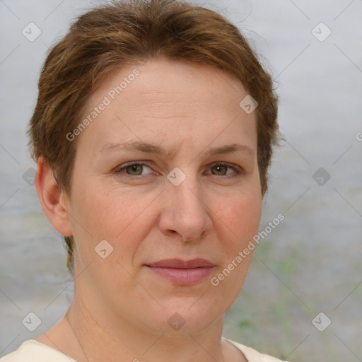 Joyful white adult female with short  brown hair and grey eyes