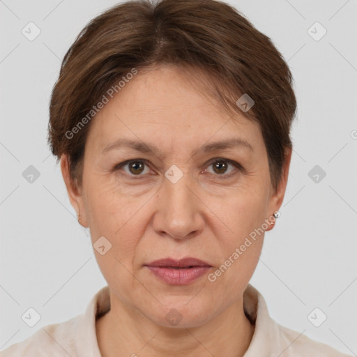 Joyful white adult female with short  brown hair and brown eyes