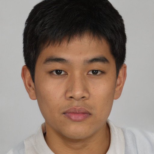 Neutral asian young-adult male with short  brown hair and brown eyes