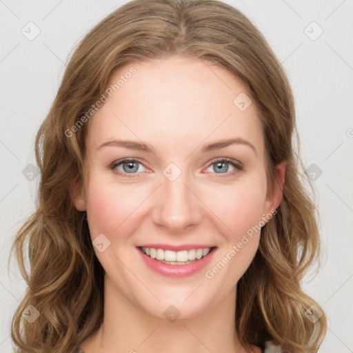 Joyful white young-adult female with long  brown hair and green eyes