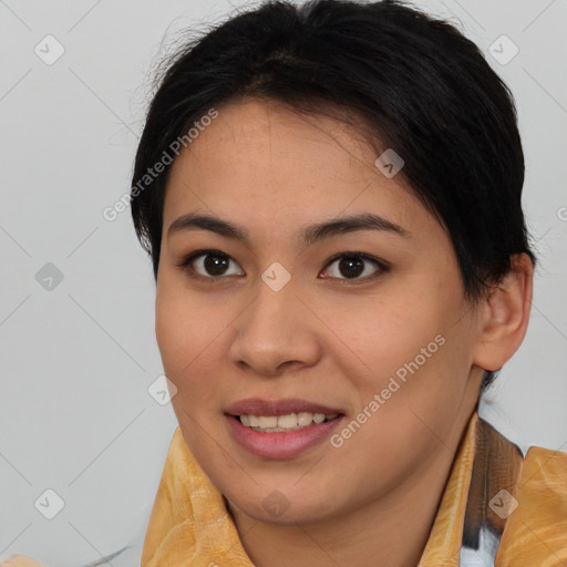 Joyful asian young-adult female with medium  brown hair and brown eyes