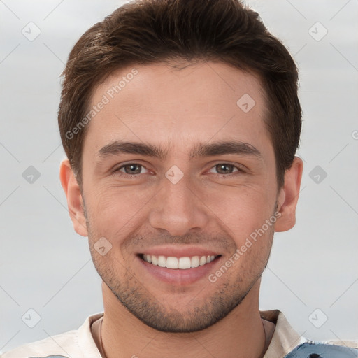 Joyful white young-adult male with short  brown hair and brown eyes