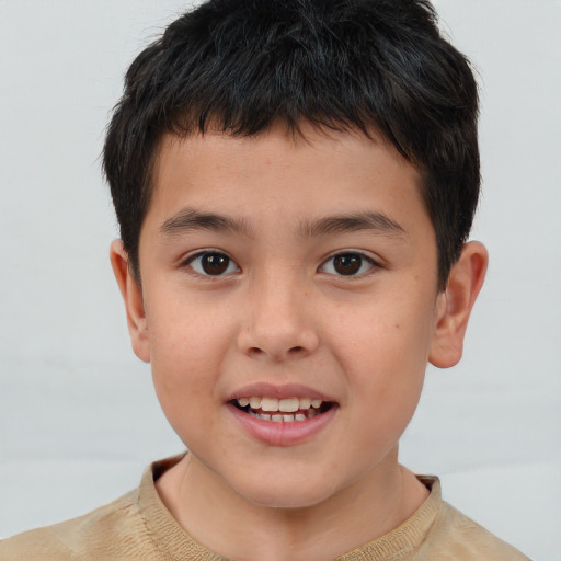 Joyful white child male with short  brown hair and brown eyes