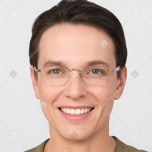 Joyful white adult male with short  brown hair and grey eyes