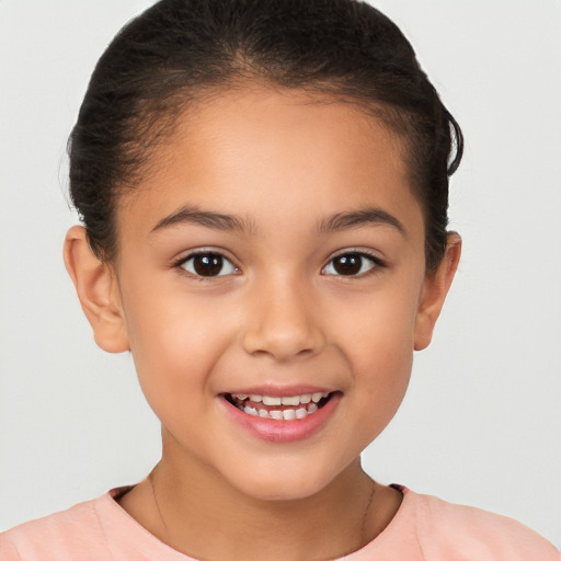 Joyful white child female with short  brown hair and brown eyes