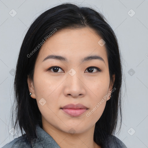 Joyful asian young-adult female with medium  black hair and brown eyes